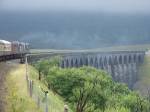 Crossing Ribblehead viaduct behind 37604 and 37607.