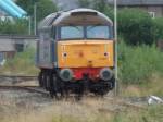 57007