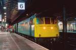 Class 85 on parcels at Crewe at night