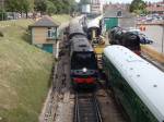 Departing Swanage - 34070 and 34028 under repair