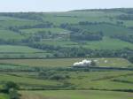 Ex LSWR M7 30053 leaving Corfe Castle