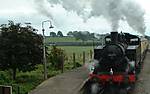 30075 + 5637 'Top n' Tailing' a passenger train pass Cranmore West, ESR