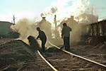 'Shovelling the clinker'