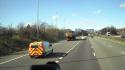 Class 56 56083 Seen On Low Loader On M6 Near Lymm 22nd March 2011.