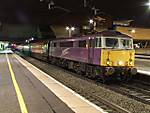 87002