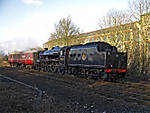 Lancashire Fusiler with support coach approaching Sowerby Bridge