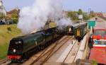 34070.manston and 34067.Tangmere depart Swanage.2.5.09.